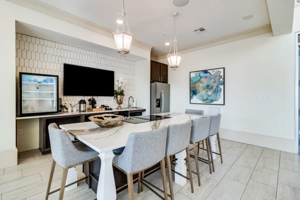 Bright common area with seating and modern decor