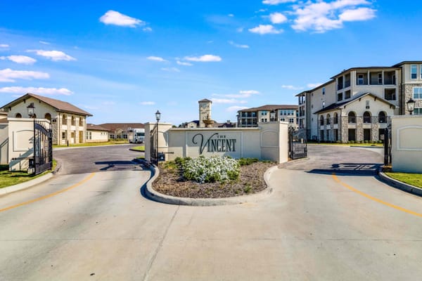 Entrance of The Vincent with well-maintained landscaping