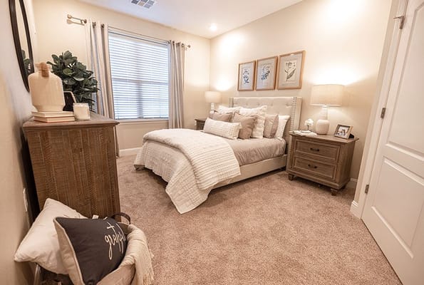 Cozy private resident room with decorated bed and lamps