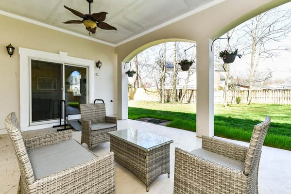 Outdoor seating area with wicker furniture