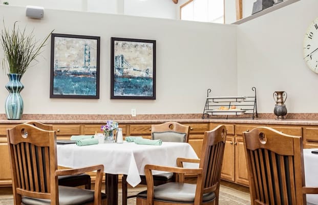 Bright dining area with tables and decor