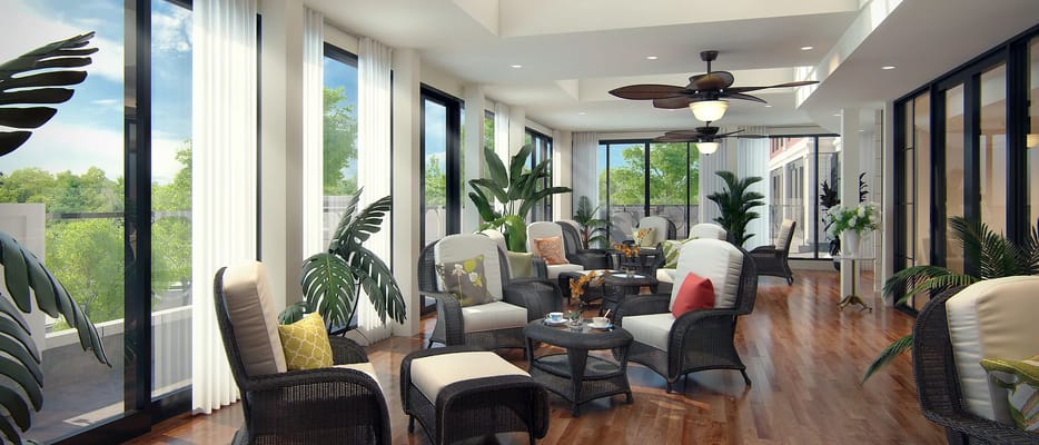 Bright common area with seating and plants