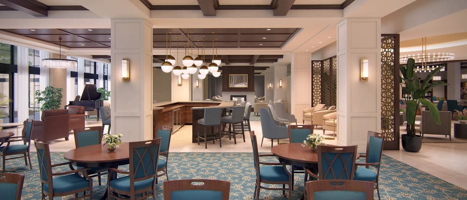 Bright interior dining and lounge area with furnishings