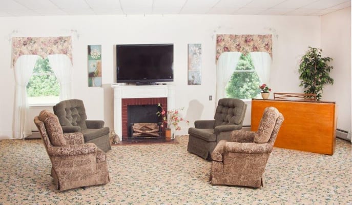 Cozy common area with seating and a television
