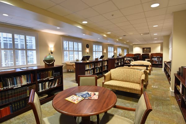 Interior view of a library with reading areas