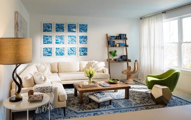 Bright, stylish common area with seating and decor