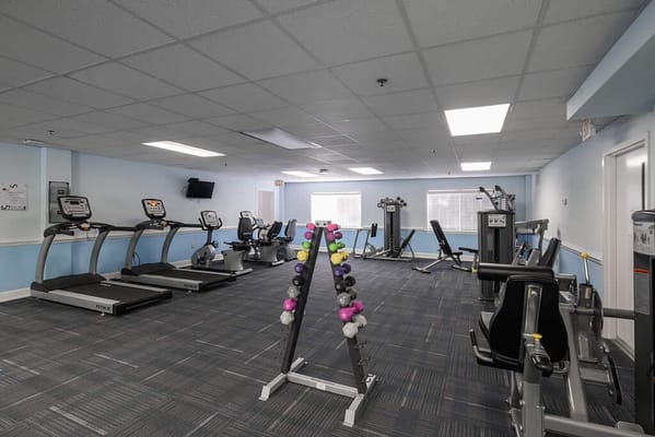 Well-equipped fitness center with exercise machines