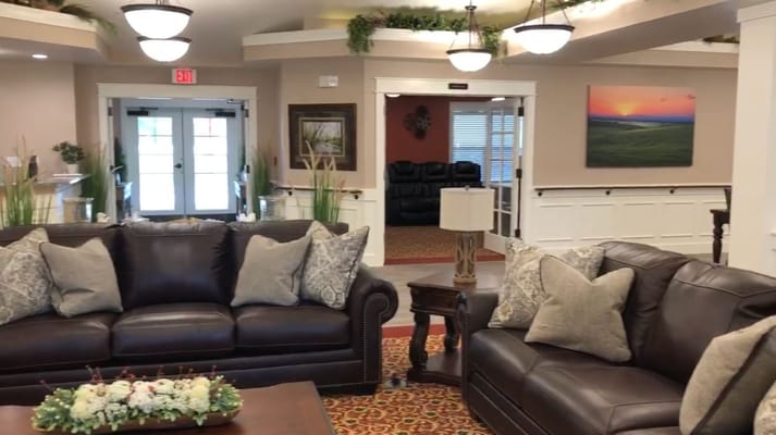 Common area with sofas and natural light