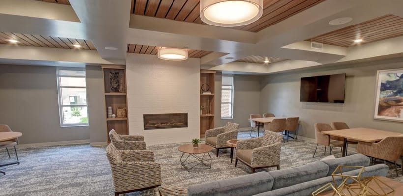 Cozy common area with seating and fireplace