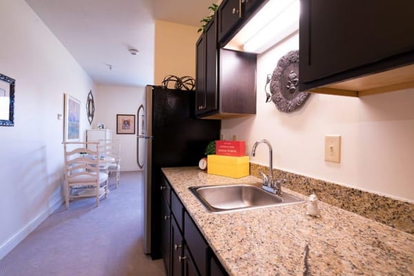 Well-equipped kitchen in a senior living facility.