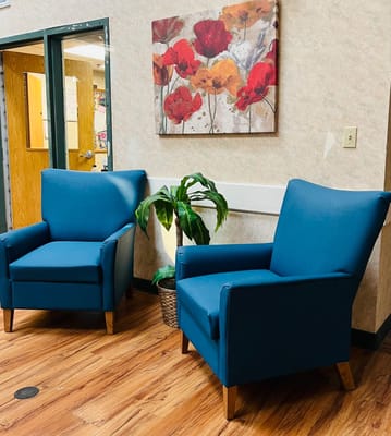 Cozy interior seating area with vibrant wall art