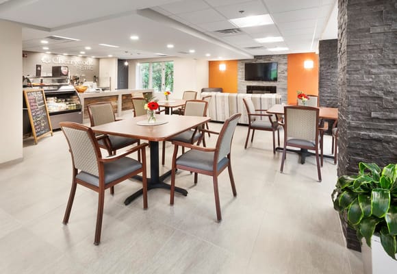 Interior view of a dining area with tables and seating