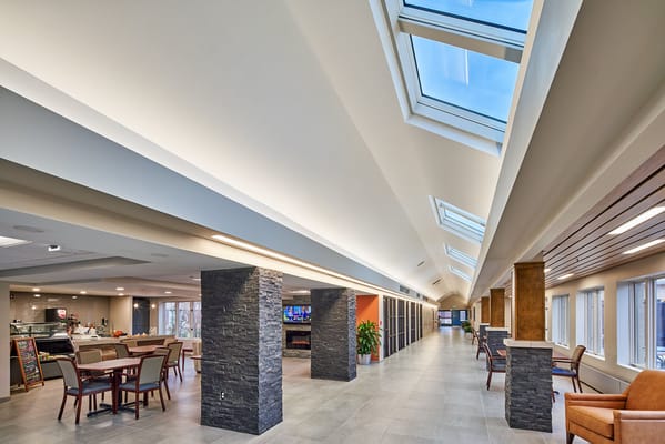 Interior view of a spacious common area with natural light