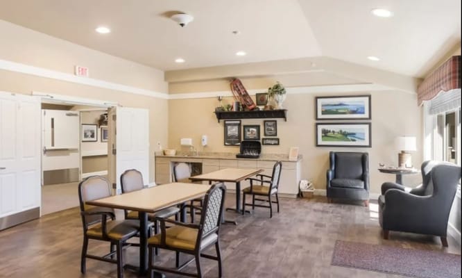 Common area with seating and decorative wall art