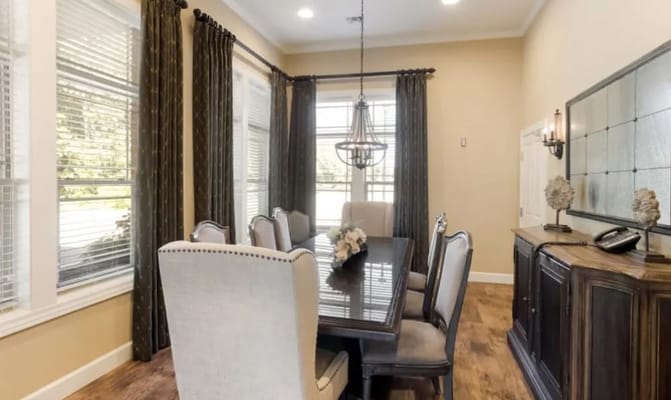 Interior dining room with a large table and chairs
