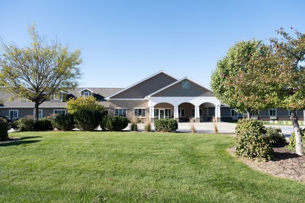 Front view of Edencrest at Green Meadows with landscaped lawns