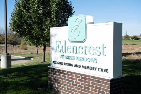 Sign for Edencrest at Green Meadows, showcasing the facility's name and services.