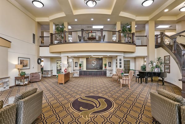 Bright and spacious lobby area of a senior living facility