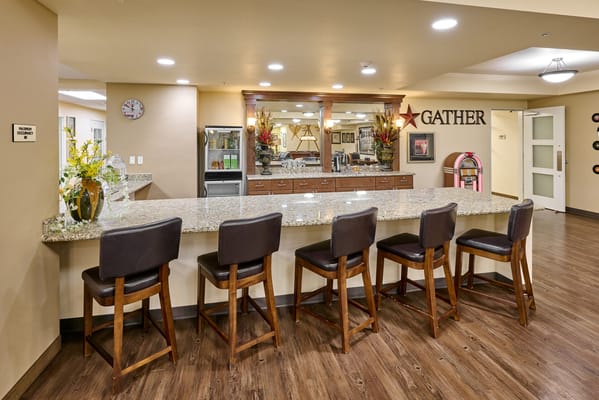Bright common area with seating and drinks