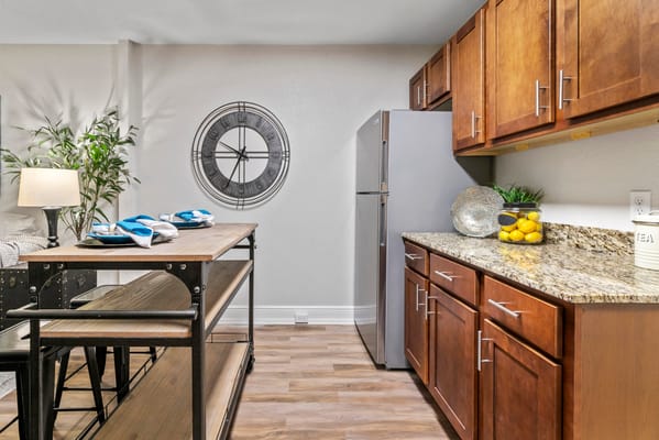 Modern kitchen area with appliances and decor