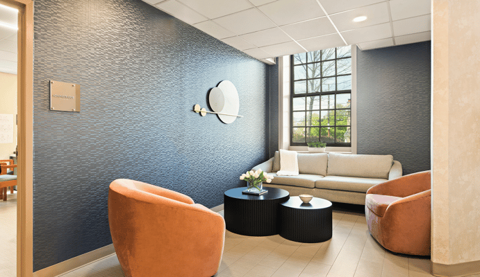 Bright common area with seating and decorative elements