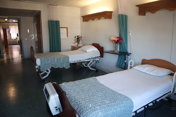 Two resident beds in a spacious private room