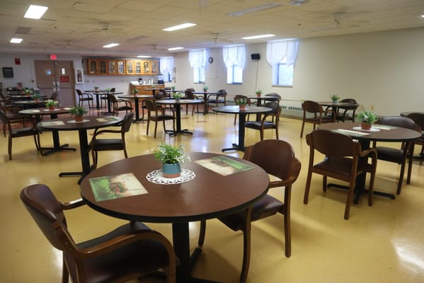 Dining area with tables and chairs arranged