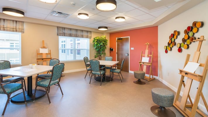 Art and activity room with easels and seating