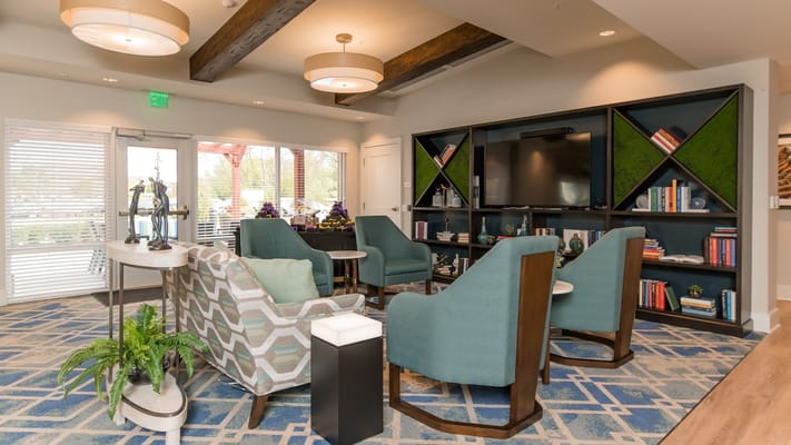 Bright common area with seating and decor