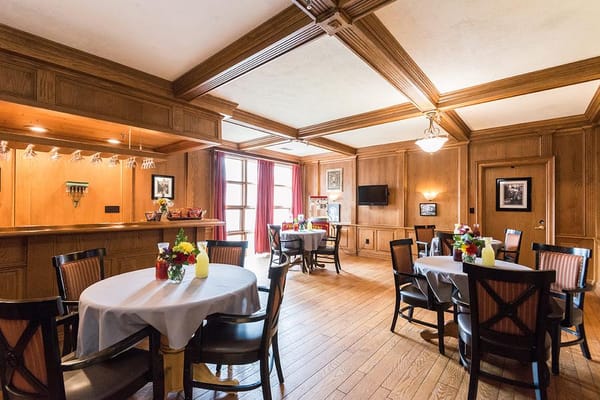 Dining area with wooden decor and tables