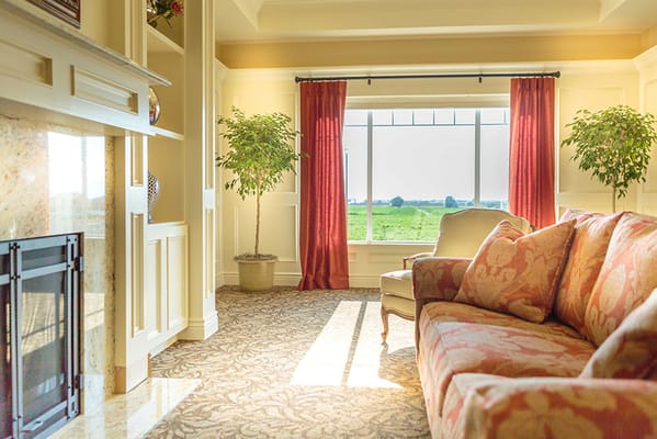 Bright interior living area with couch and view