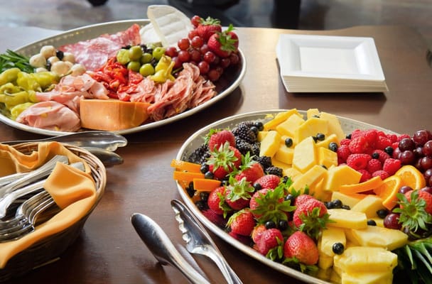 Platter of assorted meats and fresh fruits