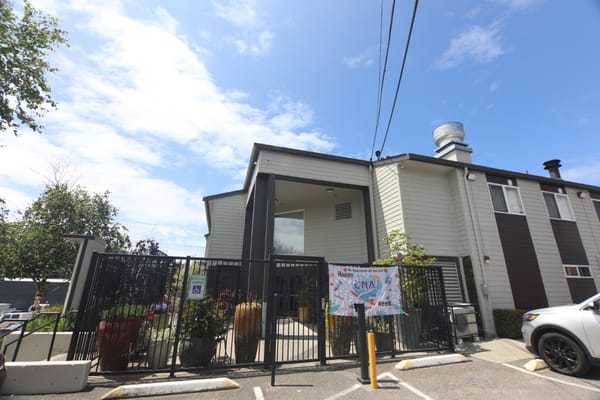 Front entrance of Cascade Park Gardens with a decorative banner.