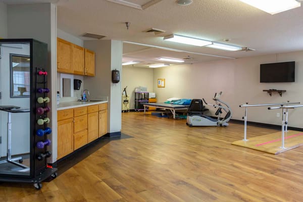 Rehabilitation therapy room with exercise equipment