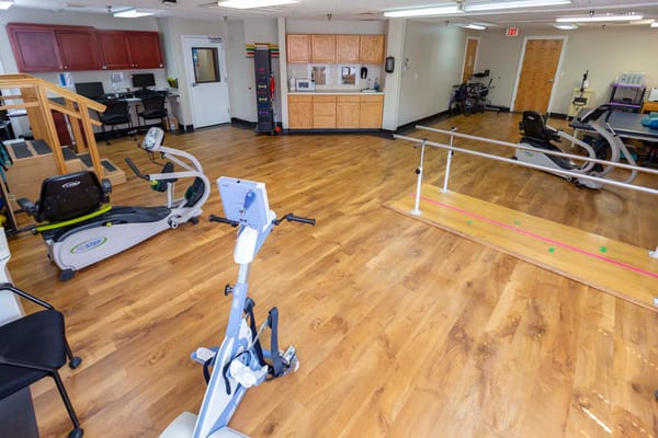 Physical therapy room with exercise equipment