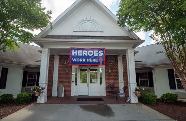 Front entrance of the facility with a banner