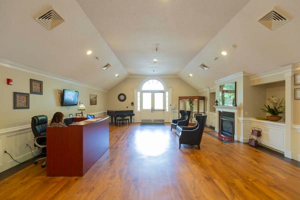 Lobby area with a reception desk and seating