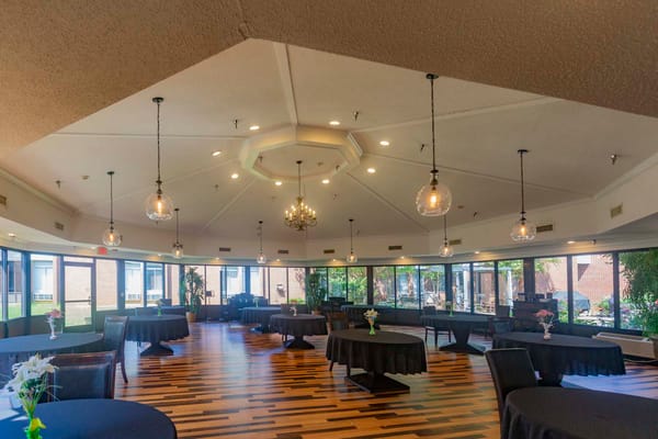 Spacious dining room with elegantly set tables