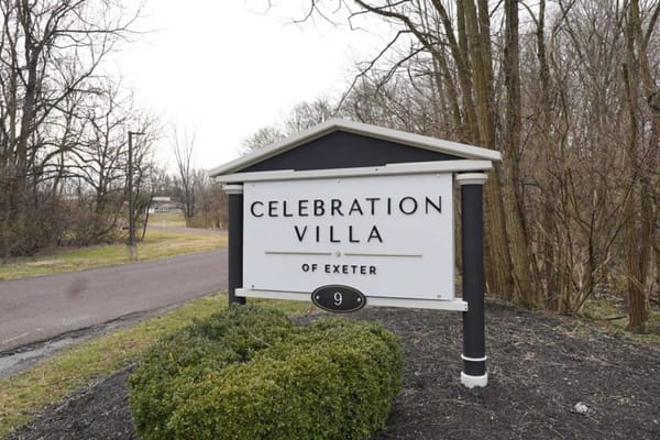 Entrance sign for Celebration Villa of Exeter
