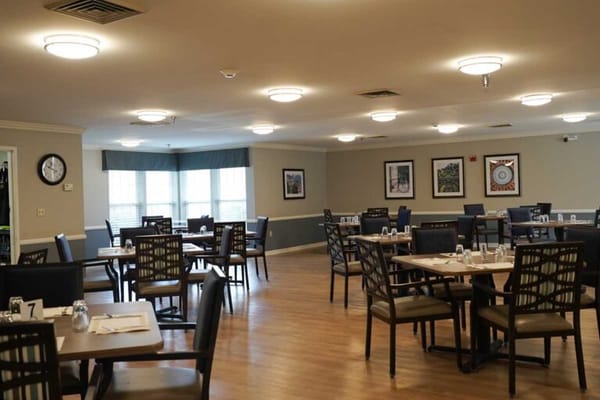 Dining room with wooden tables and chairs