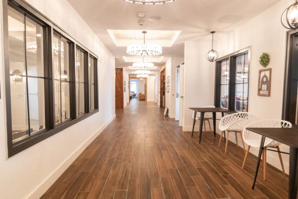 Bright interior hallway of a nursing home