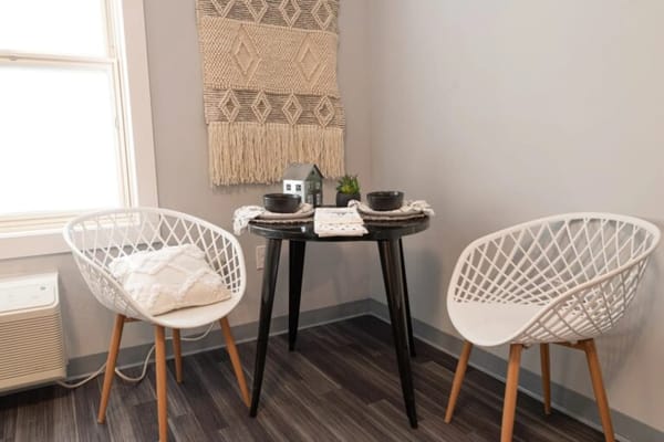 Cozy corner with two chairs and a small table