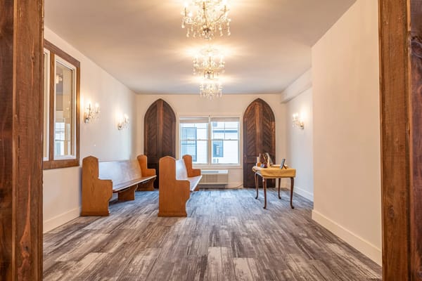 Spacious common area with elegant decor and seating