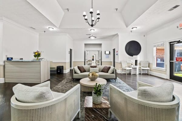 Bright lobby area with comfortable seating and decorations