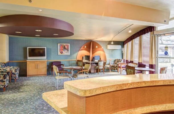 Common area with seating and computer desk