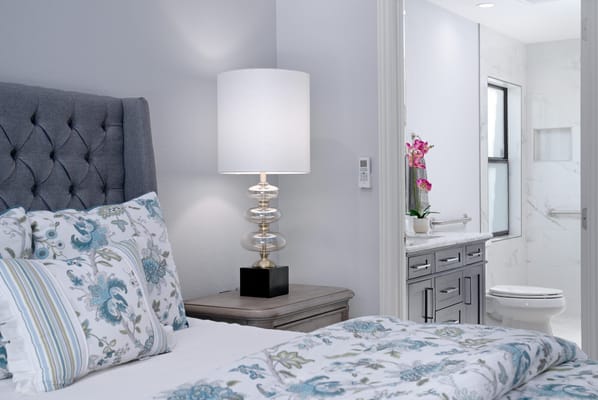 Cozy bedroom with floral bedding and modern decor