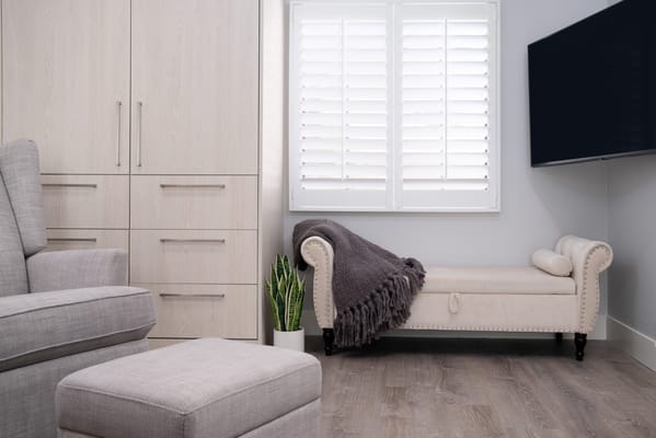 Cozy lounge area with a chaise and plants