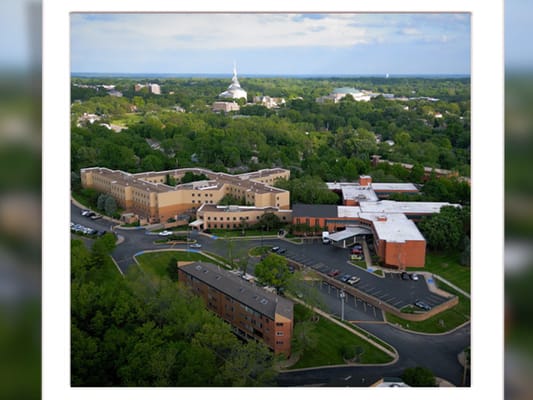 Aerial view of Forest View Senior Living campus surrounded by greenery