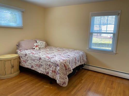 Cozy private room with a bed and window