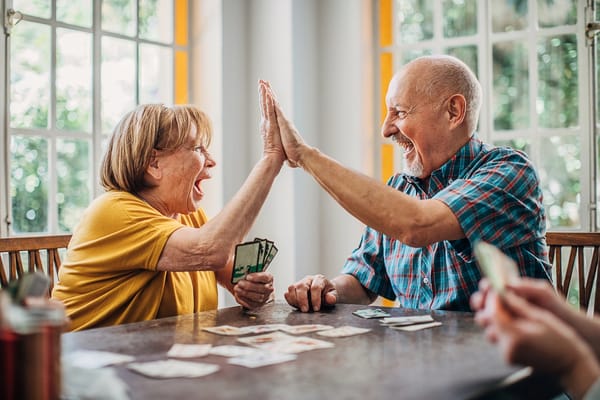 Residents playing cards and enjoying each other’s company